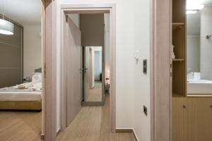 Posteľ alebo postele v izbe v ubytovaní Cataleya Villa Chania
