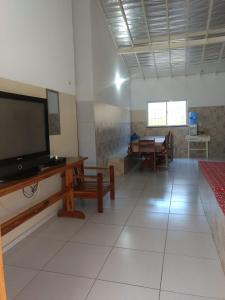 TV a/nebo společenská místnost v ubytování casa atalaia