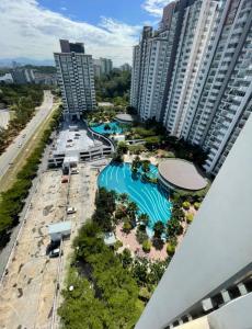 an aerial view of a resort with a pool at MR 16 Homestay Putrajaya Dwiputra in Putrajaya