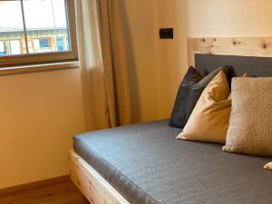 Letto o letti in una camera di Chalet Tuxer