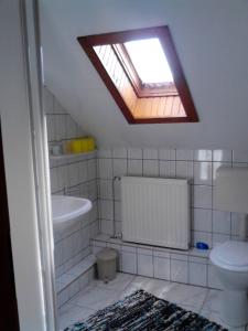 Kúpeľňa v ubytovaní Vadvirág vendégház