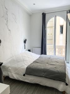 Postel nebo postele na pokoji v ubytování Villa Berlioz