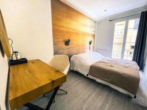 Postel nebo postele na pokoji v ubytování Villa Berlioz