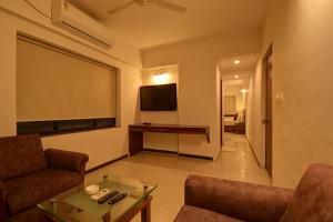 Televisi dan/atau pusat hiburan di SRTC Hotel Aspire