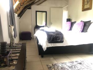 Ένα ή περισσότερα κρεβάτια σε δωμάτιο στο Villa Jullienne - A Home Away From Home - Unit 8