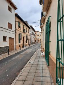 an empty street in an old town at Pension Jean Franco room Dylano in Purchena