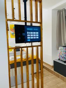 a television sitting on top of a bunk bed at Casa das Férias in Lisbon