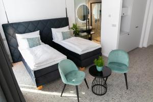 Postel nebo postele na pokoji v ubytování Hotel Central Park