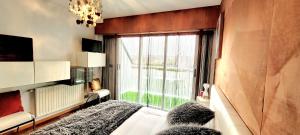 Katil atau katil-katil dalam bilik di TheLBhome-Moderno duplex con terrazas wifi-Netflix