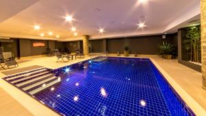 Бассейн в Motto Premium Hotel&Spa или поблизости