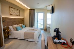 Posteľ alebo postele v izbe v ubytovaní Hotel Boutique O Náutico Laxe
