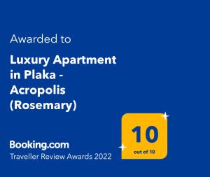 een geel bord dat luidt toegekend aan luxe appartement in plaza acapulco ap bij Luxury Apartment in Plaka - Acropolis (Rosemary) in Athene