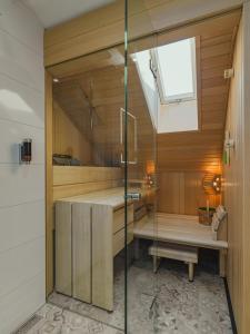 a sauna with a glass shower in a room at BS Boutique Hotel in Heidelberg