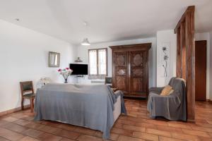 Postel nebo postele na pokoji v ubytování La Génova