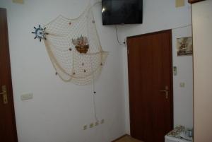 TV a/nebo společenská místnost v ubytování Rooms Tia