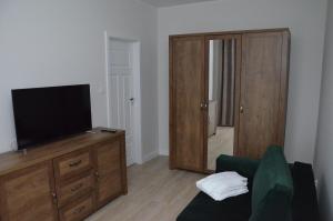 Telewizja i/lub zestaw kina domowego w obiekcie Apartament Luna Baltic Marina Residence