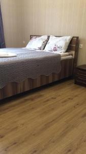 Giường trong phòng chung tại Guest house Babaka