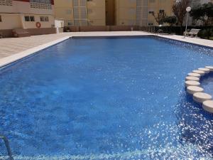 Bazén v ubytovaní DON XIMO GANDIA - Alquiler solo familias alebo v jeho blízkosti