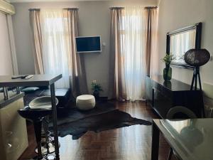 TV a/nebo společenská místnost v ubytování Apartment Abbazia
