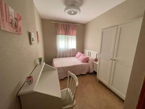 Säng eller sängar i ett rum på Casa Moraira