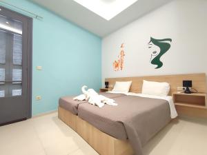 Ένα ή περισσότερα κρεβάτια σε δωμάτιο στο CASA DE MIKEL 2
