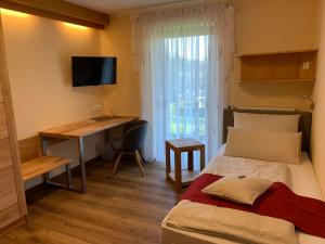 Postel nebo postele na pokoji v ubytování Gästehaus Köglmaier