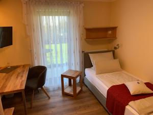 Postel nebo postele na pokoji v ubytování Gästehaus Köglmaier