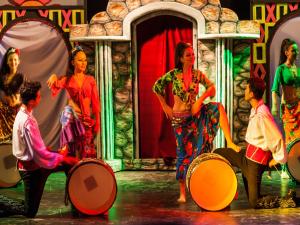 a group of people on a stage with drums at Lykia Botanika Beach Fun & Club - All Inclusive in Fethiye