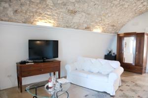 TV a/nebo společenská místnost v ubytování Gli Orti Di Malva B&B
