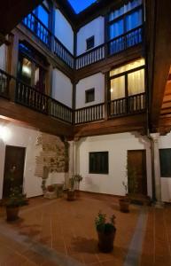 an inside view of a building with a balcony at El Rinconcito de la Merced in Toledo