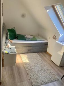 מיטה או מיטות בחדר ב-Haus Am Burghain