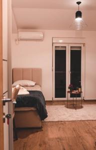 Llit o llits en una habitació de Auto kamp Titograd