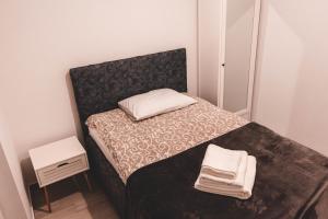 Llit o llits en una habitació de Auto kamp Titograd