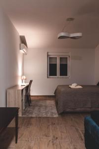 Llit o llits en una habitació de Auto kamp Titograd