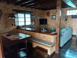 TV a/nebo společenská místnost v ubytování Casa La Fonte
