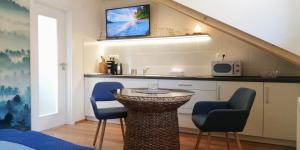 Kuchyň nebo kuchyňský kout v ubytování Apartmány Cechovní