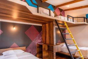 מיטה או מיטות בחדר ב-The Grand La Paz Experience Hotel Boutique
