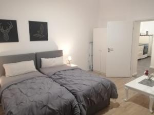 Postel nebo postele na pokoji v ubytování Apartment Cologne