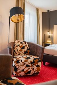 Postel nebo postele na pokoji v ubytování Berghotel & Chalets Adersberg Chiemgau Card kostenfrei