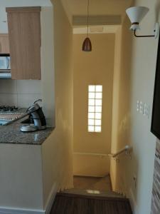 Kuchyň nebo kuchyňský kout v ubytování Apartamento Aconchegante de luxo da Elena