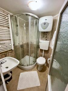 Koupelna v ubytování Apartment Velago + 37 fotografií