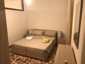 A bed or beds in a room at Da Piero e Lidia