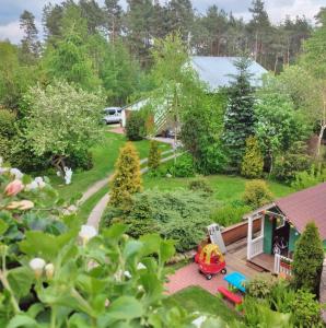 an aerial view of a yard with a toy truck at Agroturystyka u Wioli i Irka , apartament u Beaty in Karsin