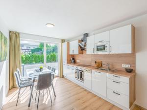 Kuchnia lub aneks kuchenny w obiekcie Apartment Alpenherz