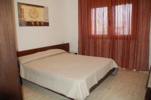 Posteľ alebo postele v izbe v ubytovaní PROALMAR, chalet 17