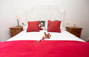 A bed or beds in a room at Casa Rural de Benitandús