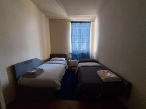 Postel nebo postele na pokoji v ubytování Mulino di Limido