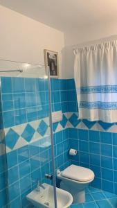 Ванна кімната в Casa Adelaide, oasi di pace con vista mare