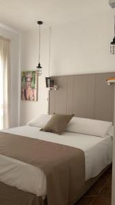 Ліжко або ліжка в номері Casa Adelaide, oasi di pace con vista mare