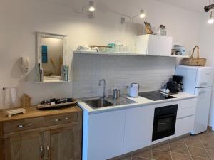 Кухня або міні-кухня у Casa Adelaide, oasi di pace con vista mare